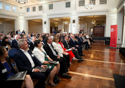 The distinguished guests attend to Dr Gordon de Brouwer PSM's address on the future of IPAA
