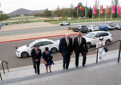 Their Excellencies make their way up the steps of Old Parliament House